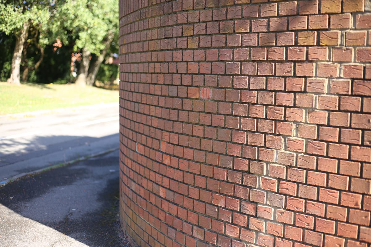 A curved brick garden wall in Colchester